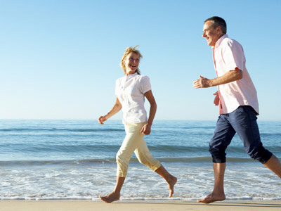 Physical Medicine Jacksonville FL Couple Running On The Beach